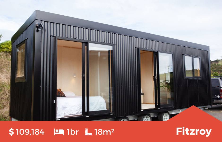 The Fitzroy Tiny Home by Fox Cabins, Raglan. Single Level Tiny Home with Bedroom, Full Kitchen and Bathroom. Ebony Black Colorsteel Cladding.