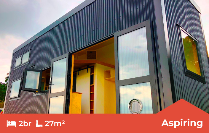 Aspiring 2 Bedroom Tiny Home in ebony colorsteel by Fox Cabins, Raglan