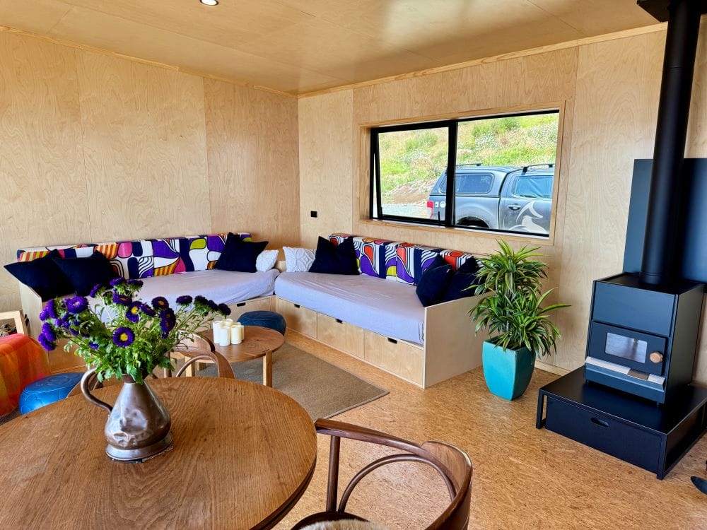 Livingroom and Fireplace of The Bach Two Bedroom Modular Home by Fox Cabins