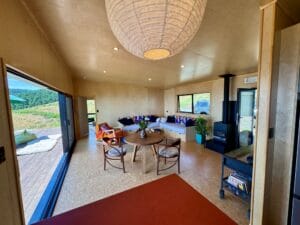 Livingroom looking from the kitchen, The Bach 60m2 prefabricated Home by Fox Cabins, Feb 2025